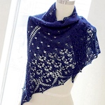 Seven ways to wear a triangle knit shawl