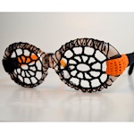 Crocheted pair of spiderweb glasses