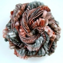 Handspun coiled yarn