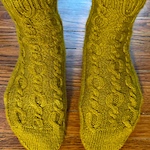 Cabled yarn to knit cabled socks