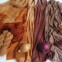 Dyes from Red Onion Skins on Wool, Cotton and Silk