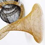 Caio Marcolini weaves delicate metal mesh into spawning cellular sculptures