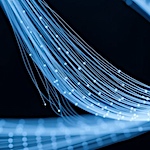 Programmable spinning weaves entire integrated circuits into a single fibre