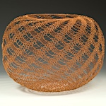 Skeletal lace patterns define copper wire vessels 