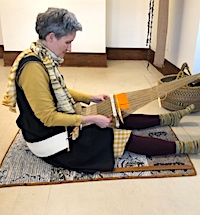 Tracy Hudson backstrap weaving at her one-person exhibition