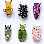 Sea slug species as whimsical felt sculptures