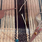 Fixing a broken warp end on a rigid-heddle loom