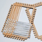 Schoolchildren create loom for turning old clothes into new textiles
