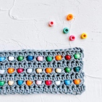 Add beads to crochet to make a weighted blanket