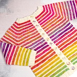Rainbow toddler cardigan in fractal handspun