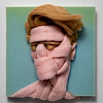 Unspun wool sculpted into intimate portraits