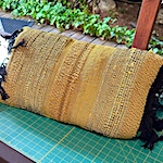 Sewing a hand woven pillow