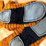 Seweing soles onto knitted slippers