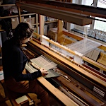 Learning to weave on a large loom