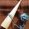 Plying on the whorl-less spindle
